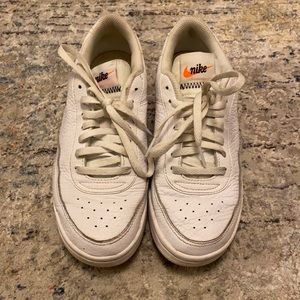 White Nike Sneakers with slight orange detailing